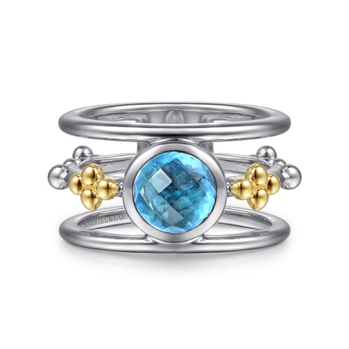 14 KARAT YELLOW GOLD AND STERLING SILVER BUJUKAN BLUE TOPAZ WIDE BAND RING
