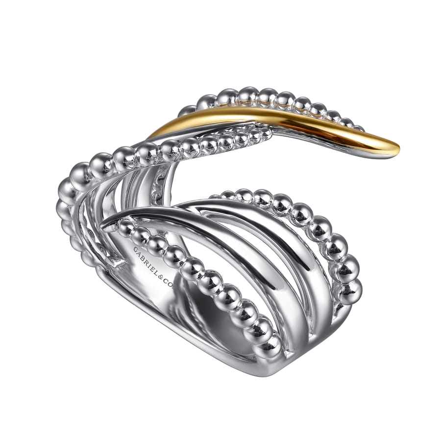 STERLING SILVER AND 14 KARAT YELLOW GOLD BUJUKAN MULTIPLE ROW BYPASS RING