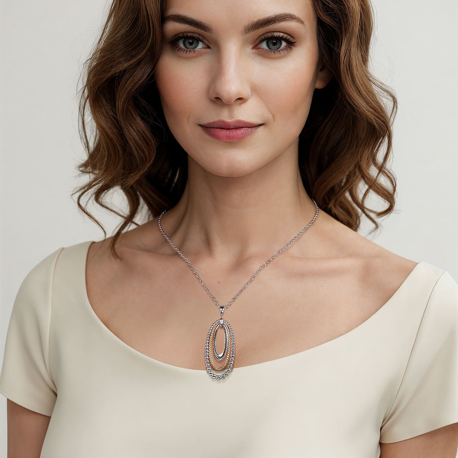 STERLING SILVER AND 14 KARAT YELLOW GOLD BUJUKAN ROPE CIRCLE PENDANT NECKLACE