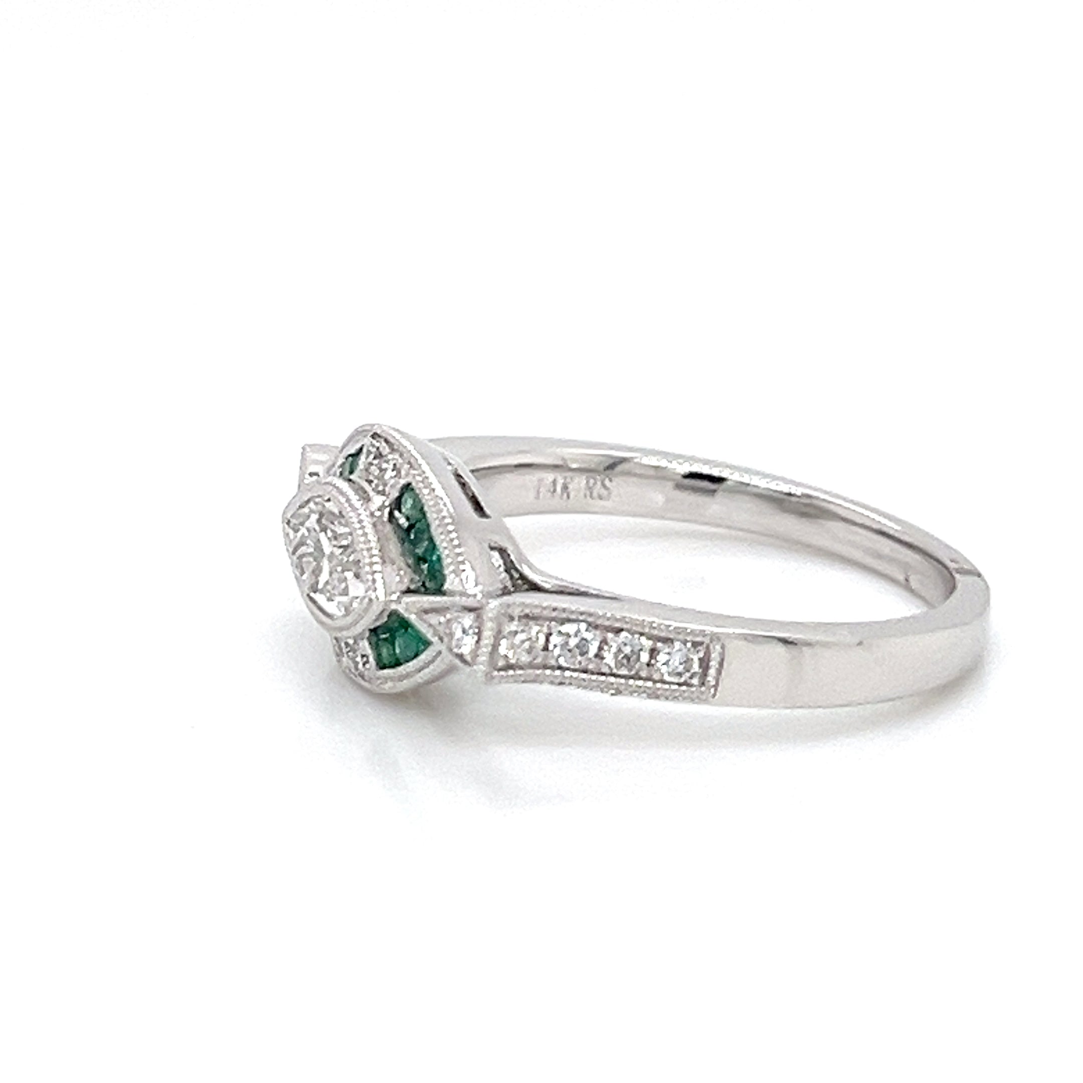 DIAMOND AND EMERALD RING