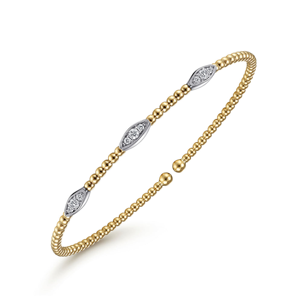 14 KARAT WHITE-YELLOW GOLD BUJUKAN DIAMOND MARQUISE STATION BANGLE