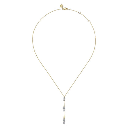 14 KARAT YELLOW GOLD GRADUATED DIAMOND STATION DROP Y NECKLACE