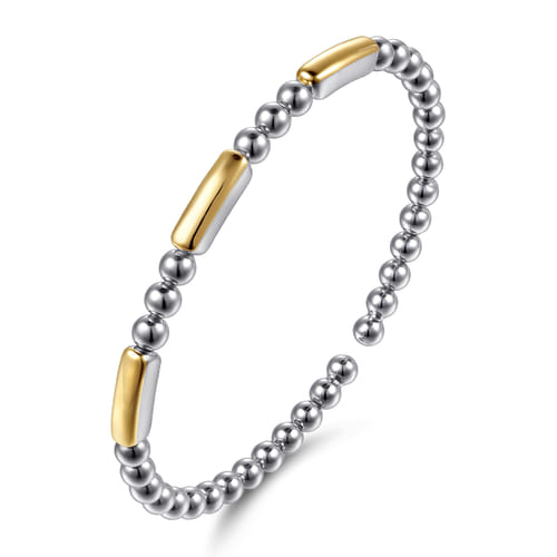14 KARAT YELLOW GOLD AND STERLING SILVER THREE STATION BAR BUJUKAN BANGLE BRACELET