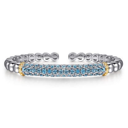 14 KARAT YELLOW GOLD AND STERLING SILVER LONDON BLUE TOPAZ BANGLE BRACELET