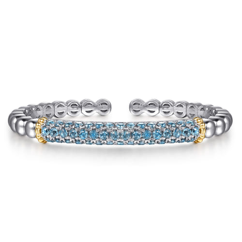 14 KARAT YELLOW GOLD AND STERLING SILVER LONDON BLUE TOPAZ BANGLE BRACELET
