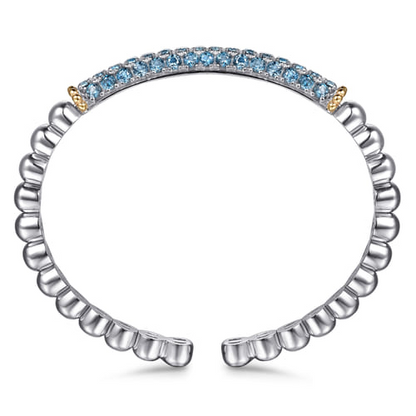 14 KARAT YELLOW GOLD AND STERLING SILVER LONDON BLUE TOPAZ BANGLE BRACELET
