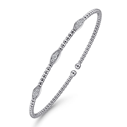 14 KARAT WHITE-YELLOW GOLD BUJUKAN DIAMOND MARQUISE STATION BANGLE