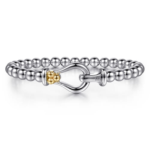 14 KARAT YELLOW GOLD AND STERLING SILVER BUJUKAN HORSE SHOE BANGLE BRACELET