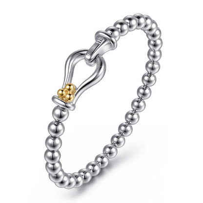 14 KARAT YELLOW GOLD AND STERLING SILVER BUJUKAN HORSE SHOE BANGLE BRACELET
