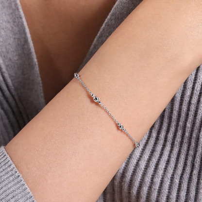 STERLING SILVER BEADED STATION BRACELET