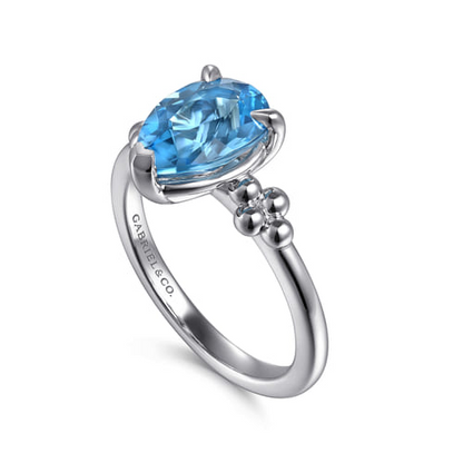 STERLING SILVER PEAR BLUE TOPAZ BUJUKAN RING