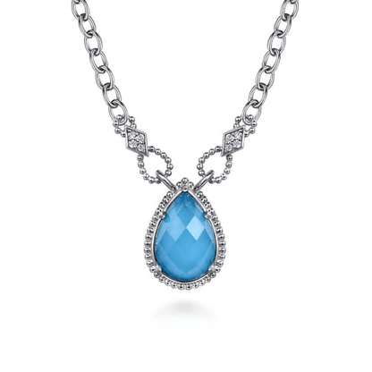 STERLING SILVER BUJUKAN WHITE SAPPHIRE AND ROCK CRYSTAL & TURQUOISE DOUBLET TEARDROP PENDANT
