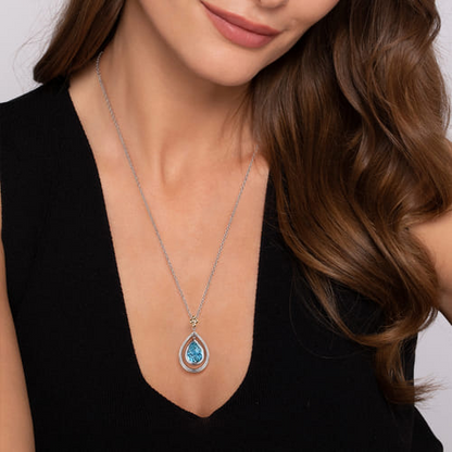 14 KARAT YELLOW GOLD AND STERLING SILVER BUJUKAN PEAR BLUE TOPAZ PENDANT NECKLACE