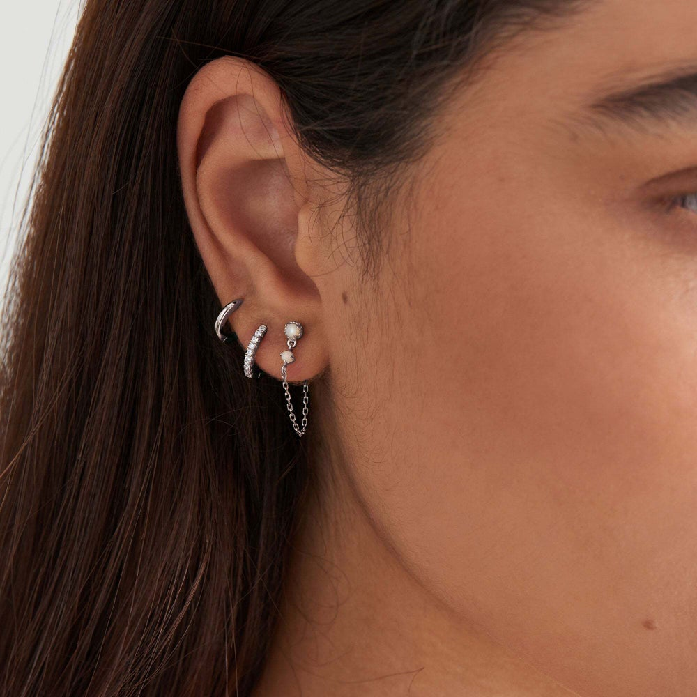 SILVER SPARKLE HUGGIE HOOP EARRINGS