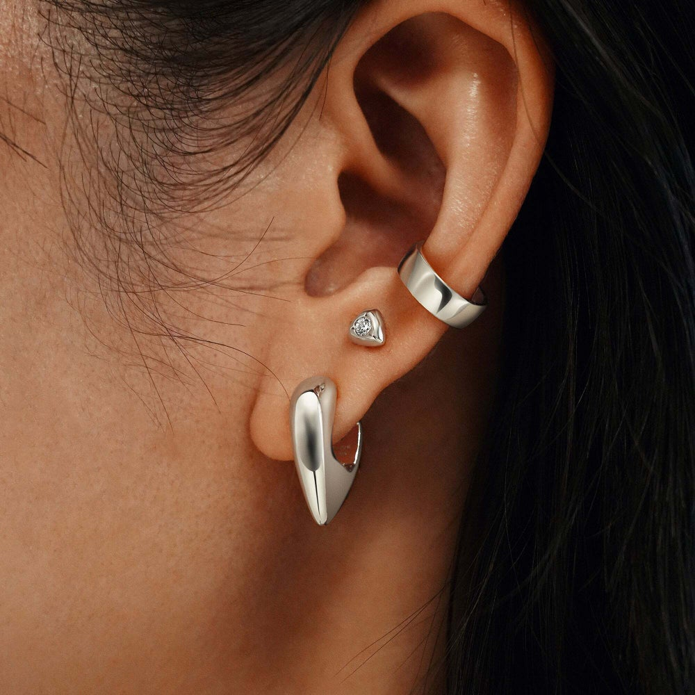 SILVER PUFFY SHIELD HUGGIIE HOOP EARRINGS