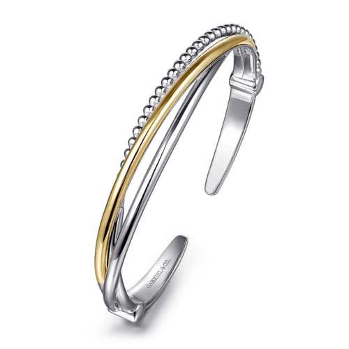 STERLING SILVER AND 14 KARAT YELLOW GOLD BUJUKAN TWISTED BANGLE BRACELET