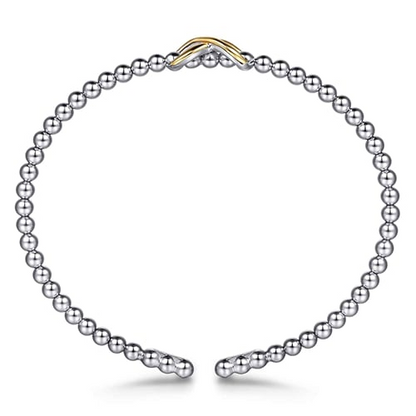 14 KARAT YELLOW GOLD AND STERLING SILVER BUJUKAN INFINITY CUFF