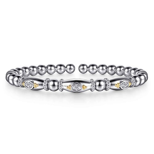 14 KARAT YELLOW GOLD AND STERLING SILVER BUJUKAN WHITE SAPPHIRE BANGLE BRACELET