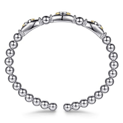 14 KARAT YELLOW GOLD AND STERLING SILVER BUJUKAN WHITE SAPPHIRE BANGLE BRACELET