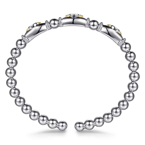 14 KARAT YELLOW GOLD AND STERLING SILVER BUJUKAN WHITE SAPPHIRE BANGLE BRACELET
