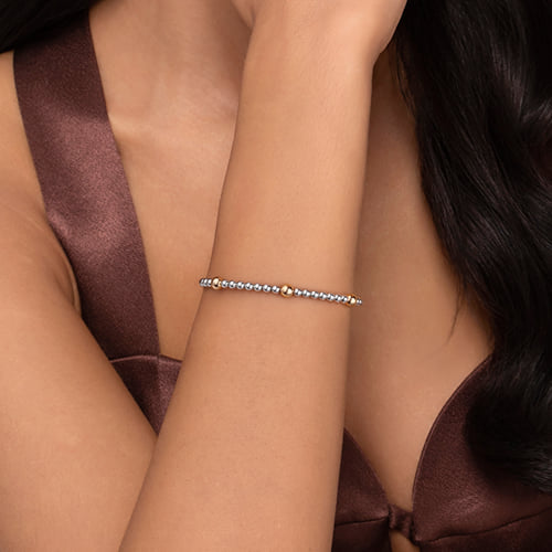 14 KARAT YELLOW GOLD AND STERLING SILVER BUJUKAN SPLIT BANGLE BRACELET
