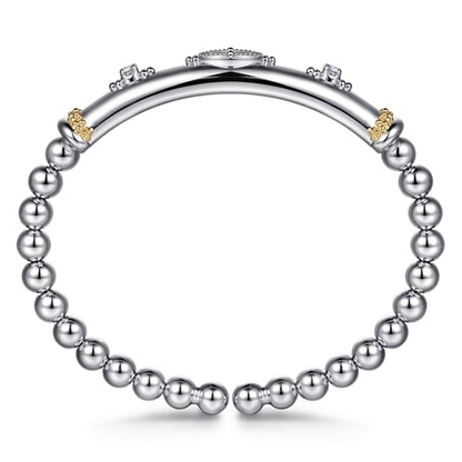 14 KARAT YELLOW GOLD AND STERLING SILVER BUJUKAN WHITE SAPPHIRE SPLIT BANGLE BRACELET