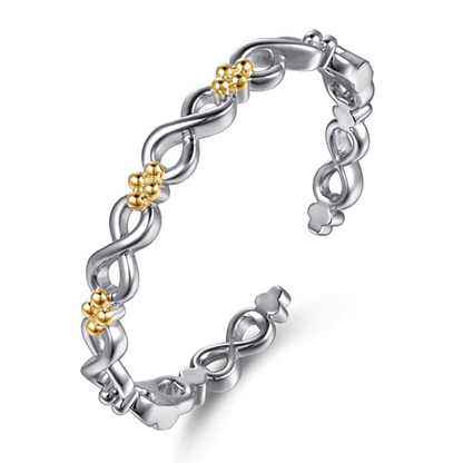 14 KARAT YELLOW GOLD AND STERLING SILVER BUJUKAN INFINITY CUFF BRACELET