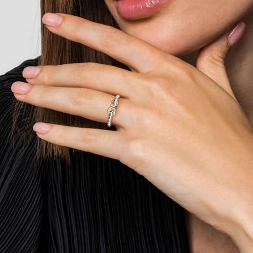 14 KARAT YELLOW GOLD AND STERLING SILVER BUJUKAN INFINITY RING