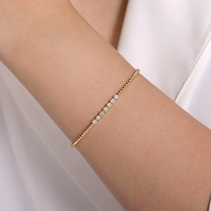 14K YELLOW GOOLD BUJUKAN BEAD AND CLUSTER DIAMOND BANGLE