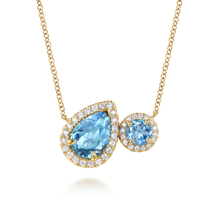 14 KARAT YELLOW GOLD TOI ET MOI BLUE TOPAZ AND DIAMOND HALO NECKLACE