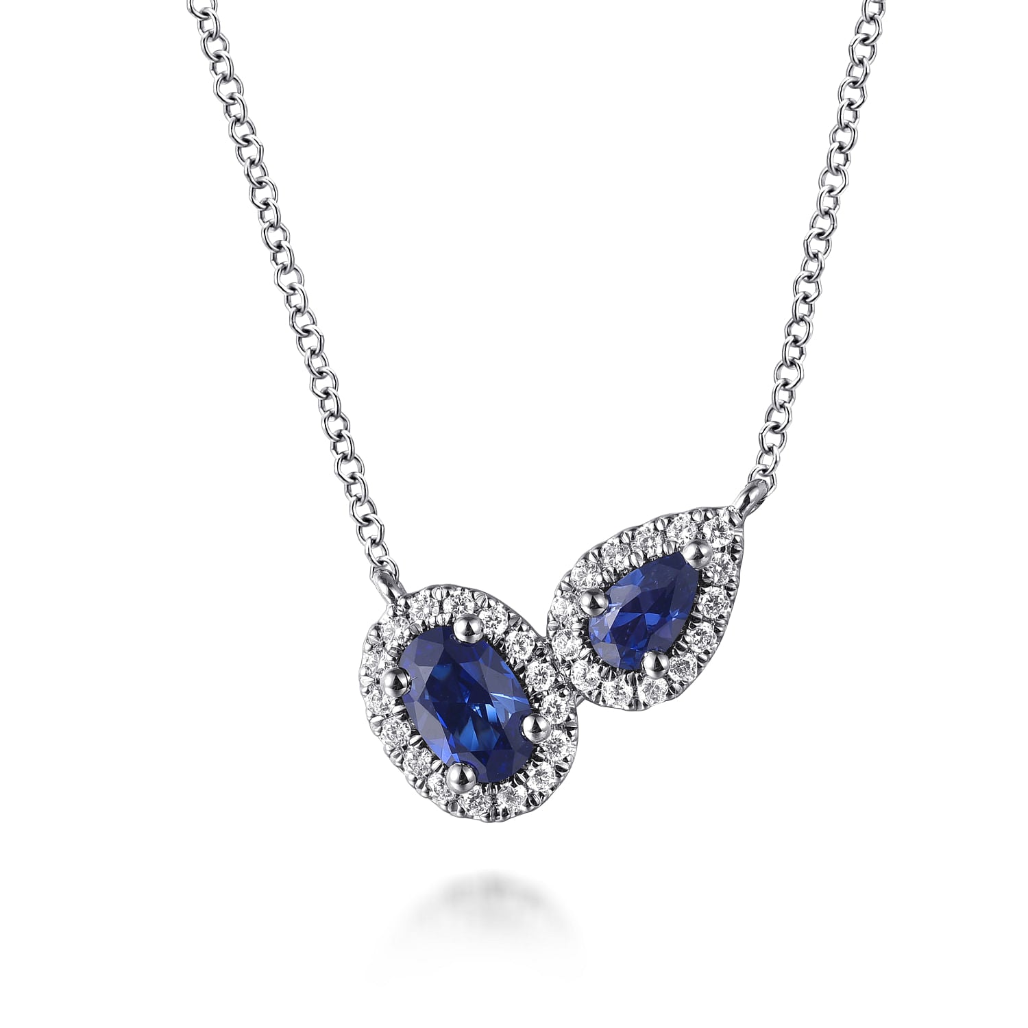 14 KARAT WHITE GOLD TOI ET MOI SAPPHIRE AND DIAMOND HALO NECKLACE