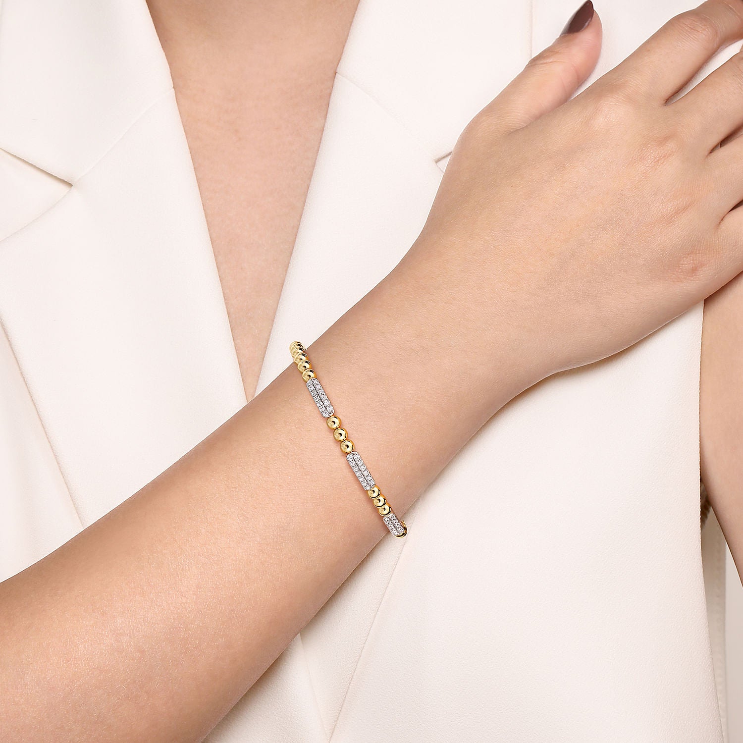 14 KARAT WHITE AND YELLOW GOLD DIAMOND PAVE THREE STATION BAR BUJUKAN BEADS BANGLE