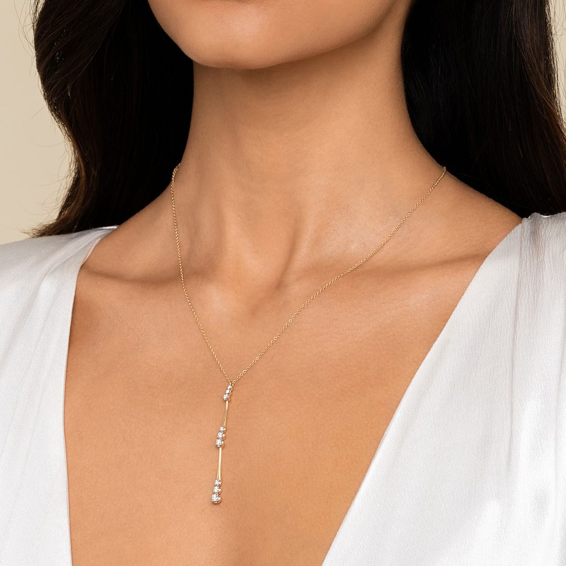 14 KARAT YELLOW GOLD GRADUATED DIAMOND STATION DROP Y NECKLACE