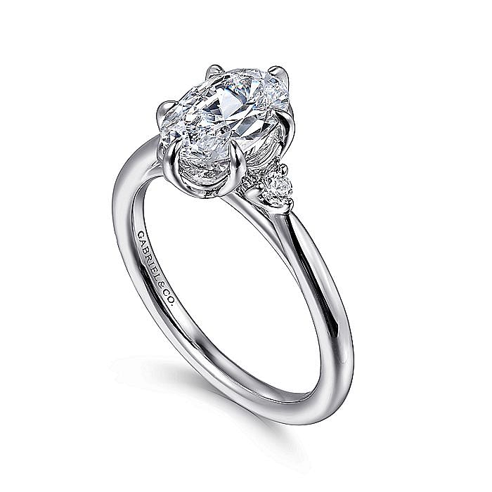 14KW MARQUISE AND ROUND ENGAGEMENT RING
