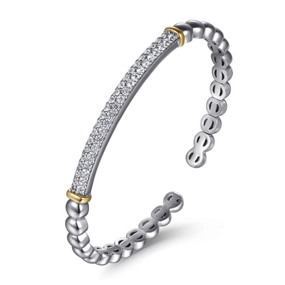 14 KARAT YELLOW GOLD AND STERLING SILVER BUJUKAN WHITE SAPPHIRE OPEN BANGLE BRACELET