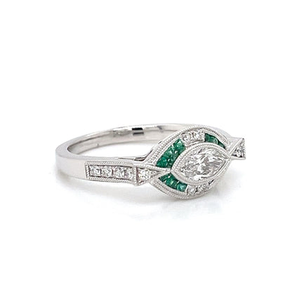 DIAMOND AND EMERALD RING