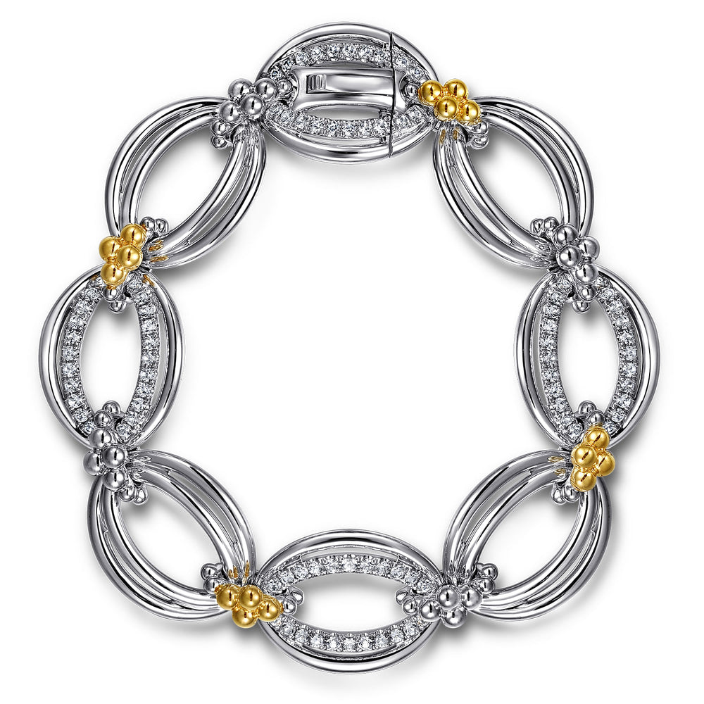 STERLING SILVER AND 14 KARAT YELLOW GOLD BUJUKAN WHITE SAPPHIRE LINK BRACELET