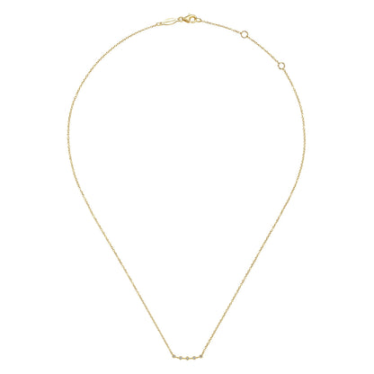 14 KARAT YELLOW GOLD  DIAMOND STATIONS CURVED BAR NECKLACE