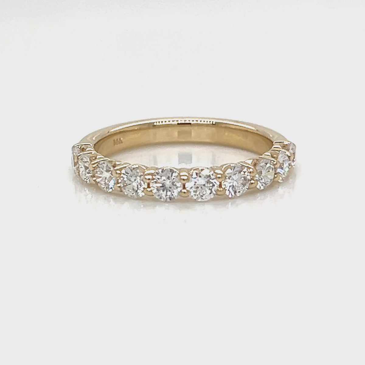 Load video: One Lady's DANIEL JOSEPH 14 Karat Yellow Women's Diamond Wedding Band