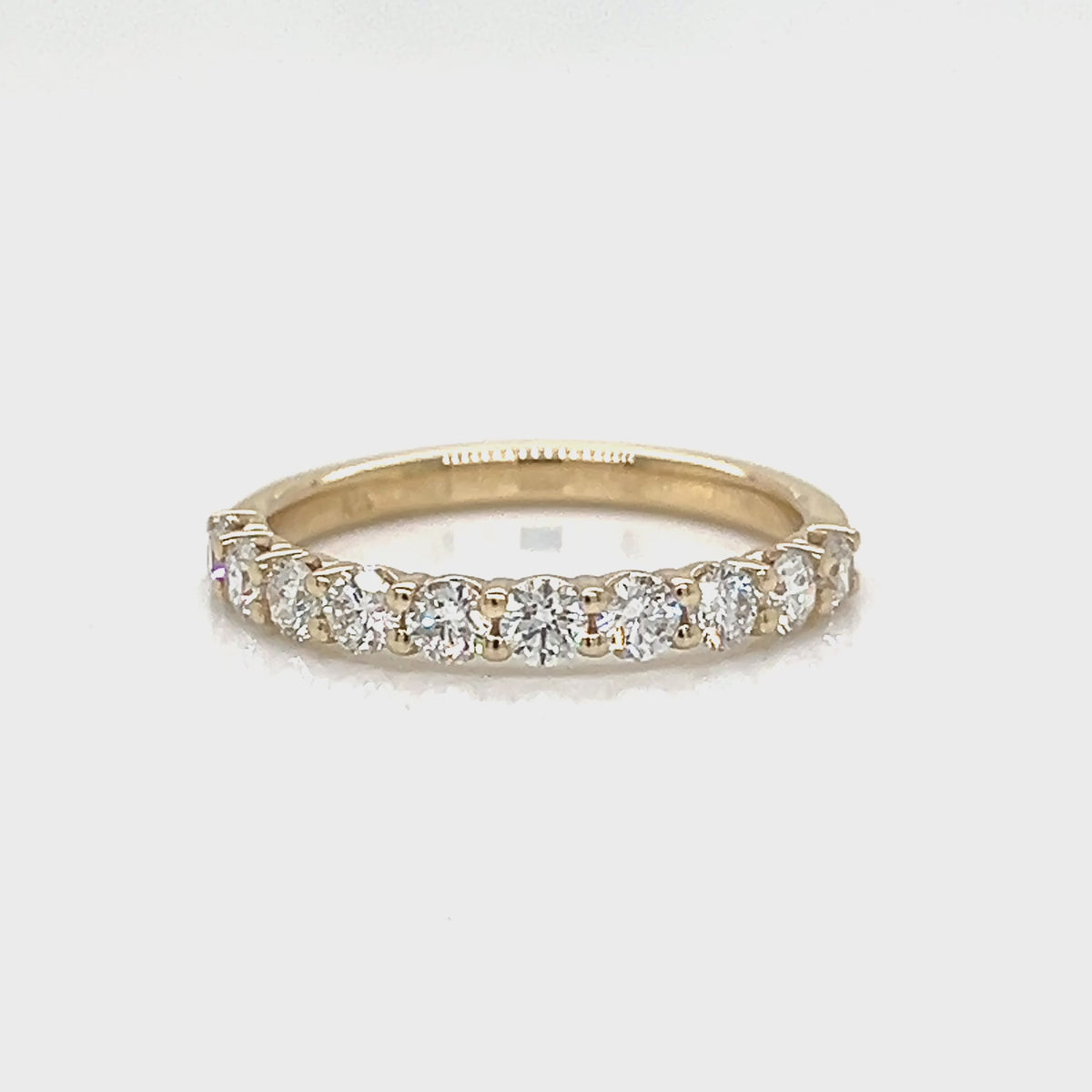 Load video: One Lady's DANIEL JOSEPH 14 Karat Yellow Women's Diamond Wedding Band