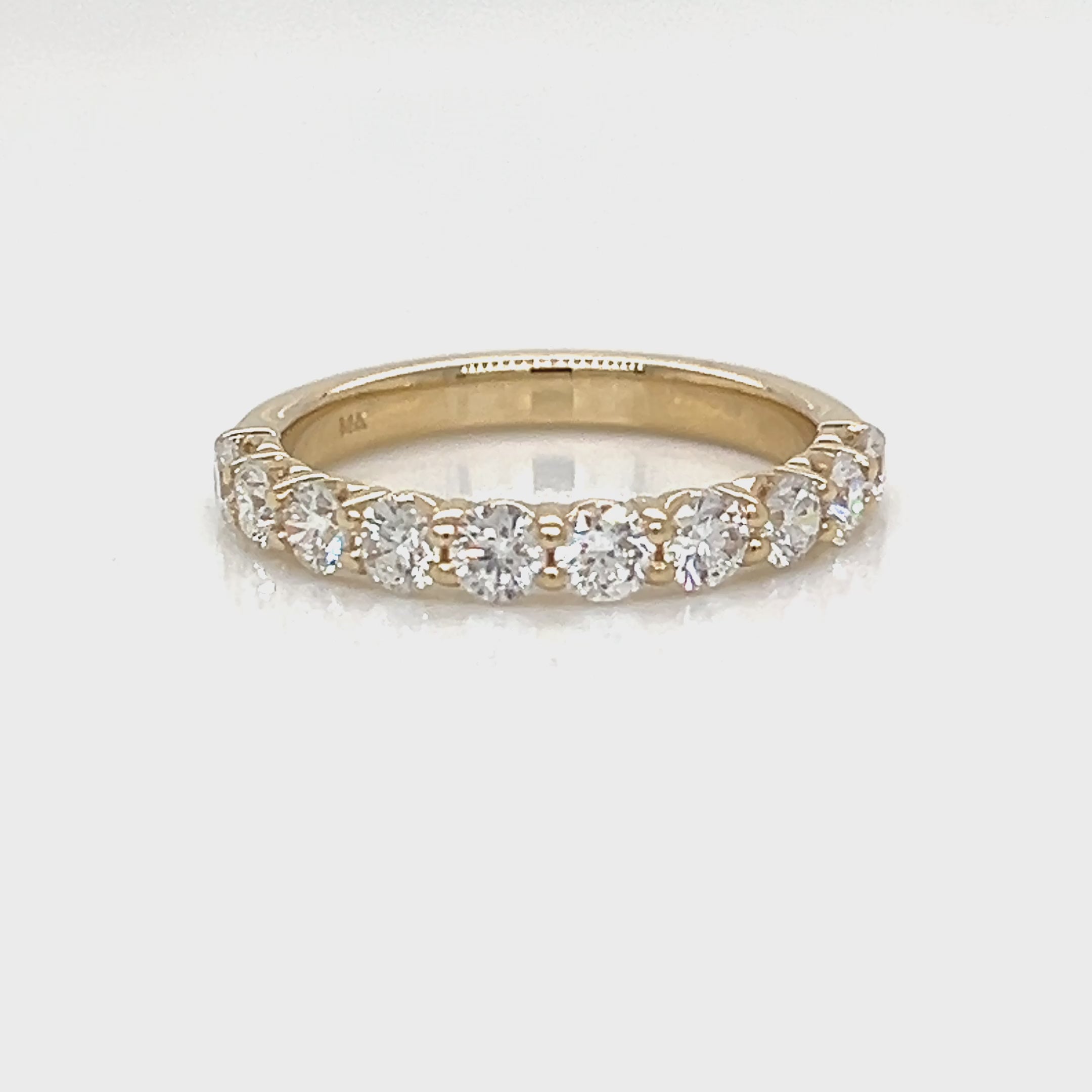One Lady's DANIEL JOSEPH 14 Karat Yellow Women's Diamond Wedding Band